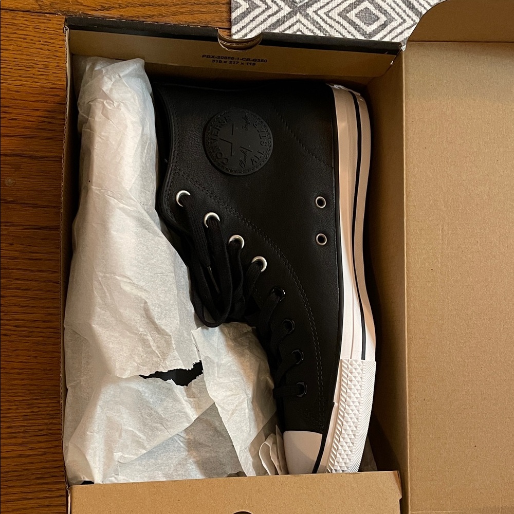 Converse Black High-Top Sneakers new in box. Never worn.